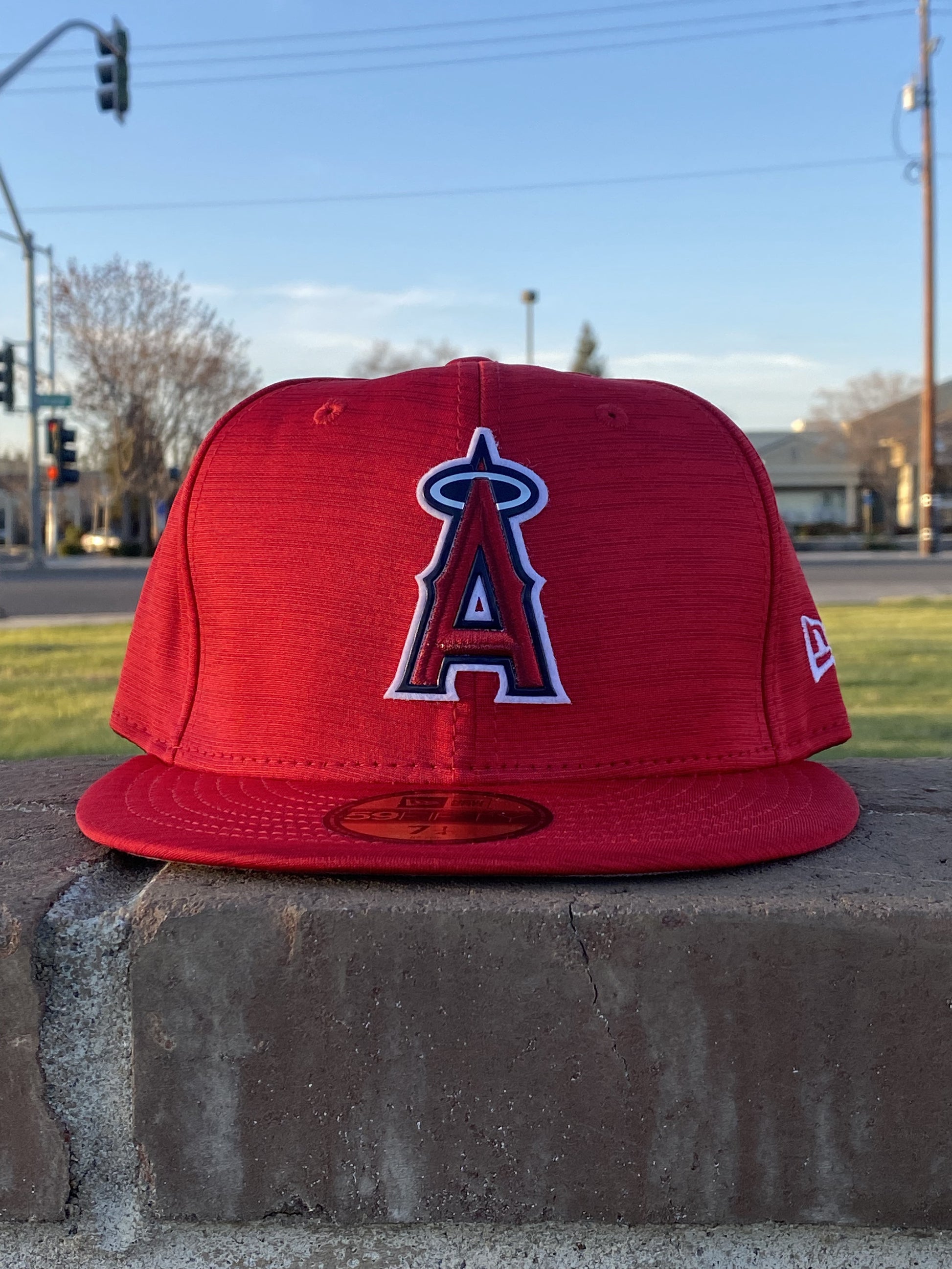 red fitted cap