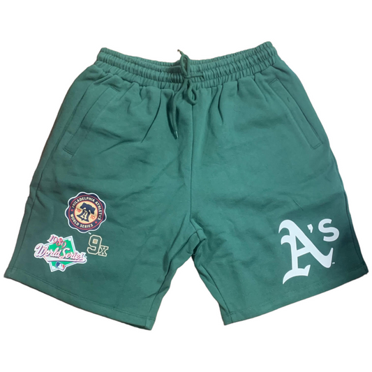 PANTALONES CORTOS DE POLAR PARA HOMBRE HISTORIC CHAMPS DE OAKLAND ATHLETICS