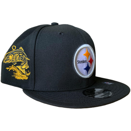 GORRA 9FIFTY CON PARCHE LATERAL DE PEZ DE LOS PITTSBURGH STEELERS